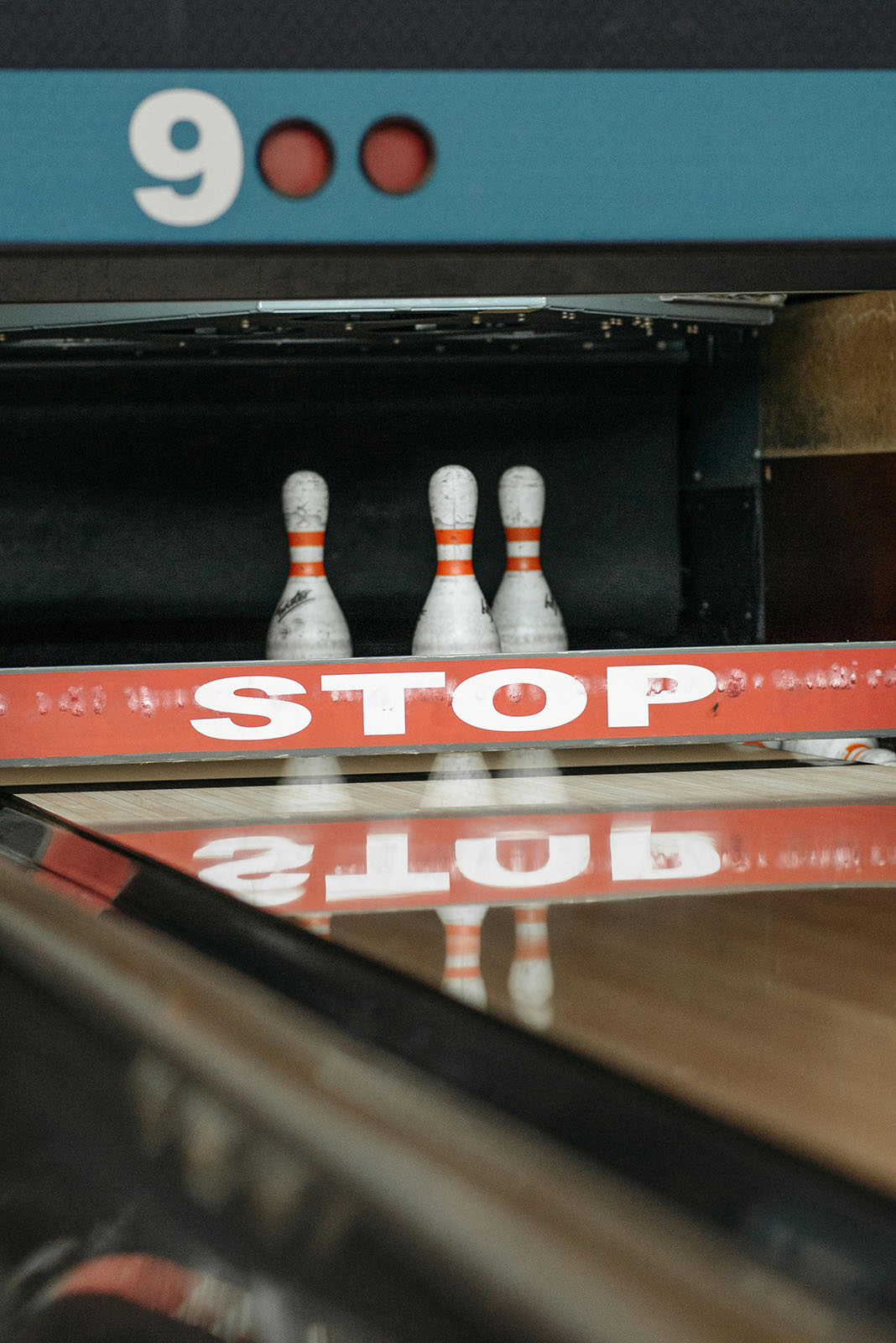 Bowling pins at end of lane
