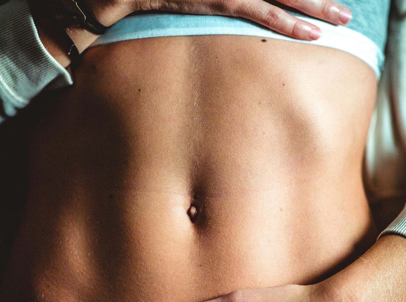 Close-up of woman's abdomen